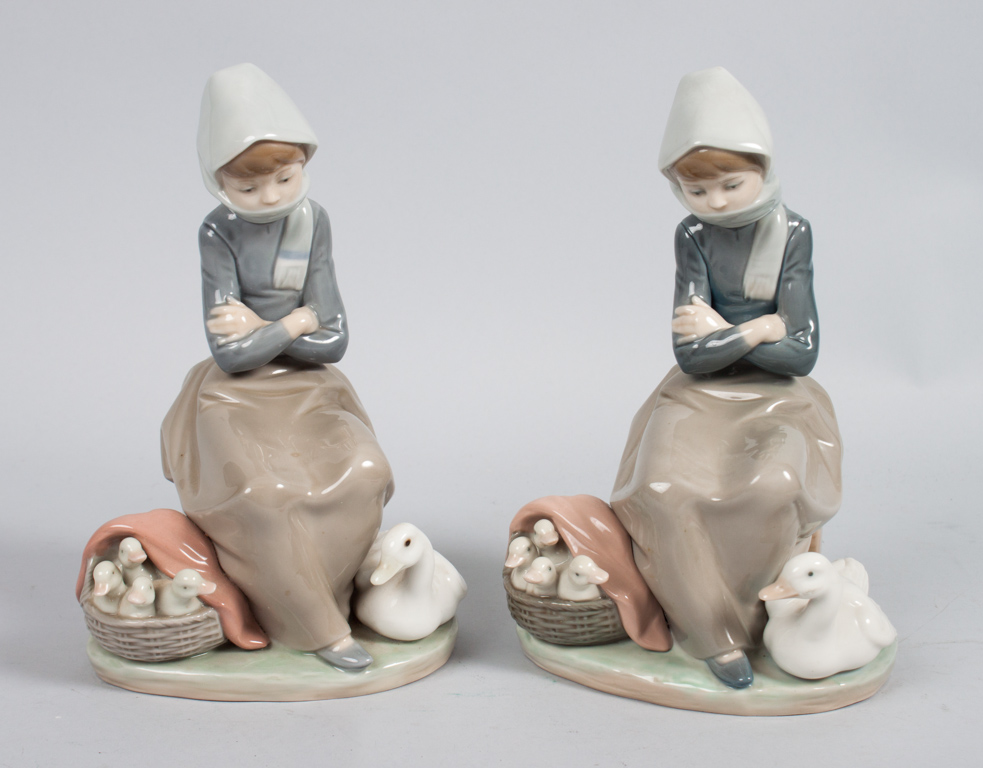 Appraisal: Pair Lladro porcelain figural groups girl with goose and basket