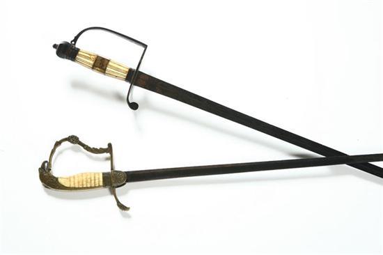 Appraisal: TWO SWORDS Nineteenth century One with eagle pommel bone handle