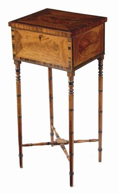 Appraisal: A Regency mahogany work table calamander banded and inlaid oval