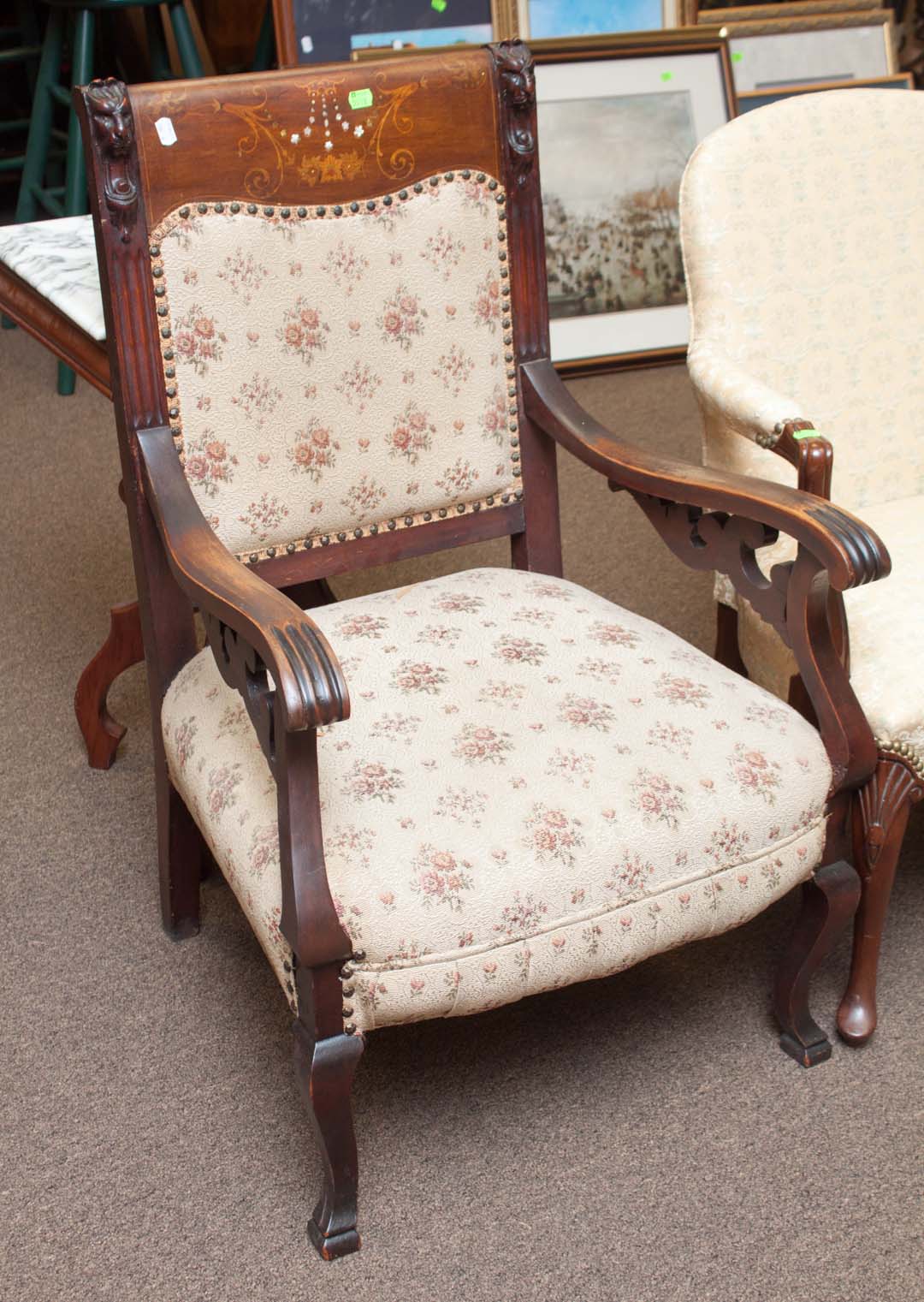 Appraisal: Carved wood and inlaid armchair