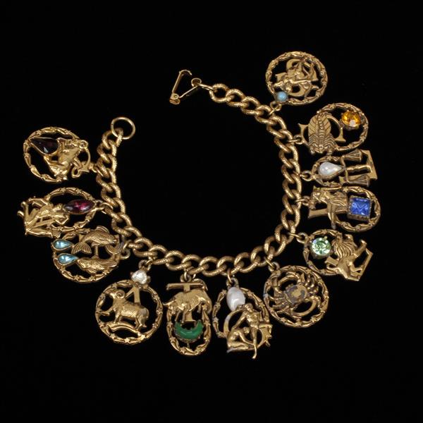 Appraisal: Florenza heavy brass jeweled zodiac charm bracelet Missing a cabochon