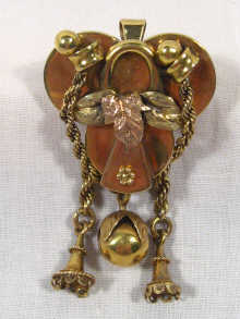 Appraisal: A carat gold brooch pendant in the form of a