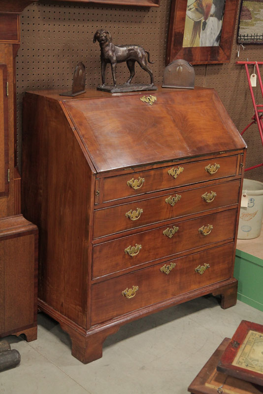 Appraisal: SLANT LID DESK Walnut and of typical form having four