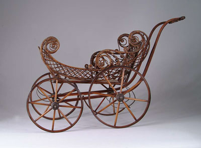 Appraisal: ORNATE WICKER DOLL BUGGY Beautiful doll buggy has ornate open