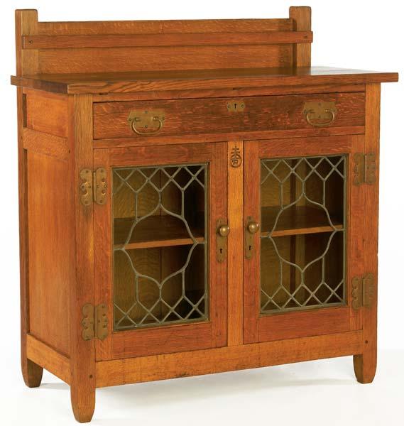 Appraisal: ROYCROFT Massive sideboard with plate rack and leaded-glass doors Extremely