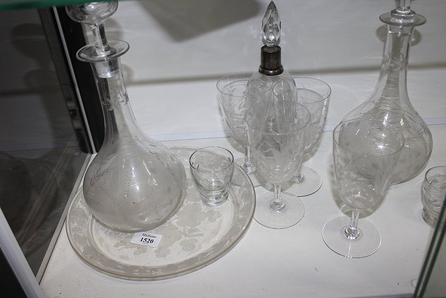 Appraisal: REPUTEDLY BACCARAT ART GLASS SUITE to include two decanters all