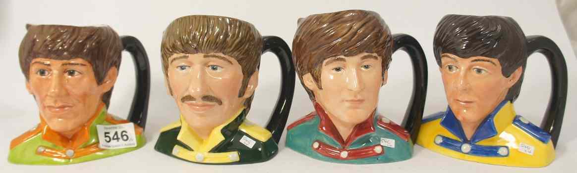 Appraisal: A Set of Royal Doulton Intermediate Character Jugs The Beatles