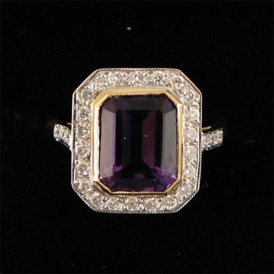 Appraisal: An amethyst and diamond cluster ring the emerald cut amethyst