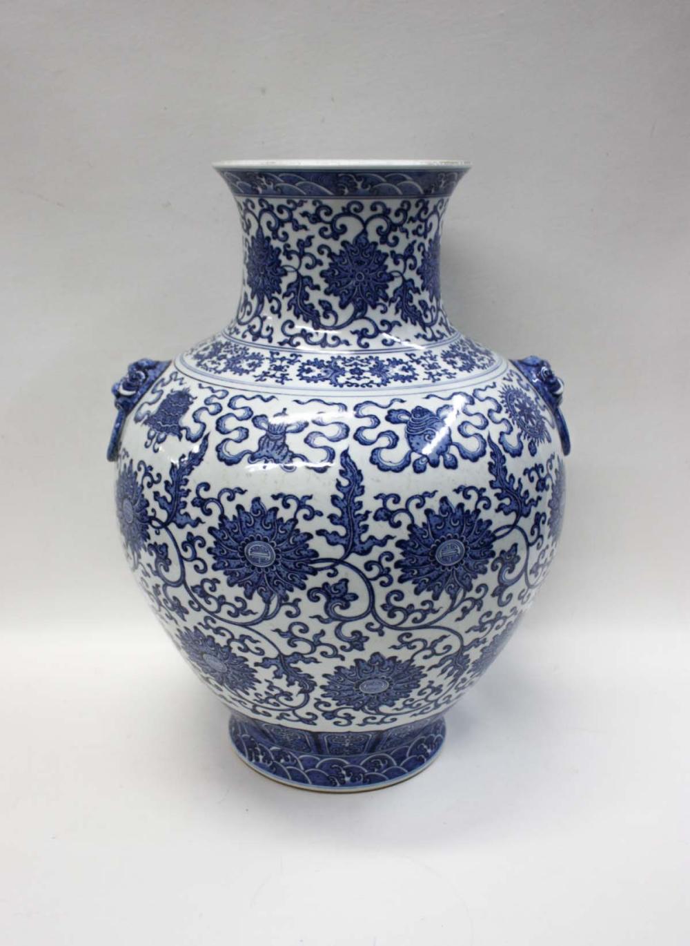 Appraisal: CHINESE BLUE AND WHITE VASE of baluster form with mask