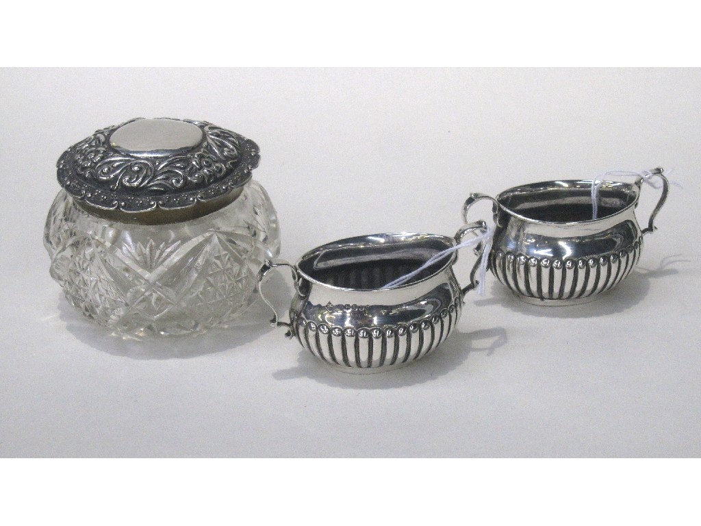 Appraisal: Lot comprising silver topped jar and a pair of silver