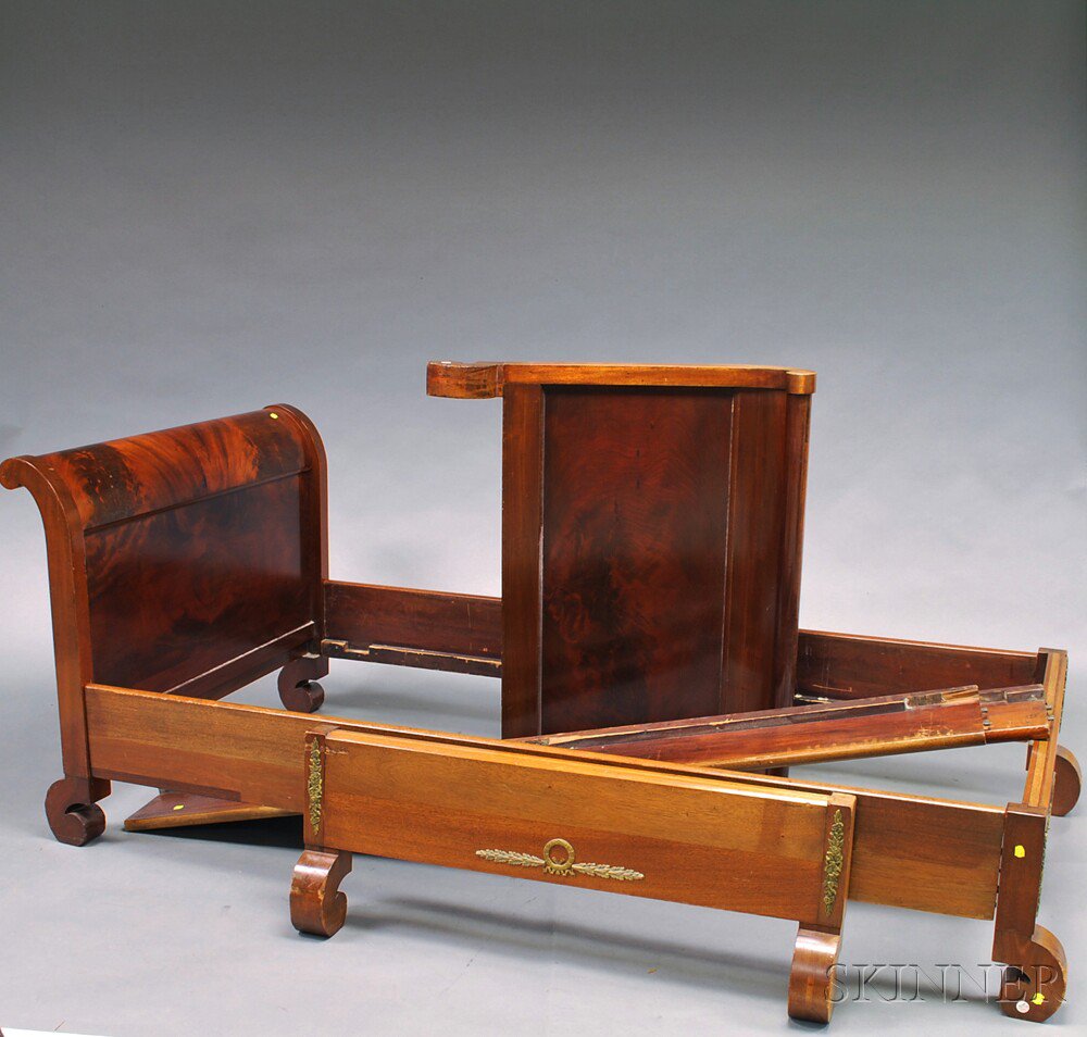 Appraisal: Pair of Empire-style Brass-mounted Mahogany Sleigh Beds imperfections ht wd