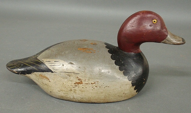 Appraisal: - Mason premier grade redhead duck decoy with yellow glass