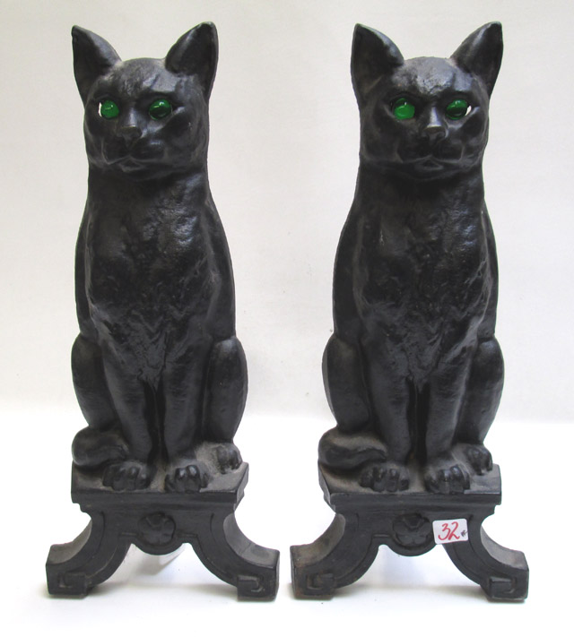 Appraisal: A PAIR OF CAST-IRON FELINE ANDIRONS American each a cast