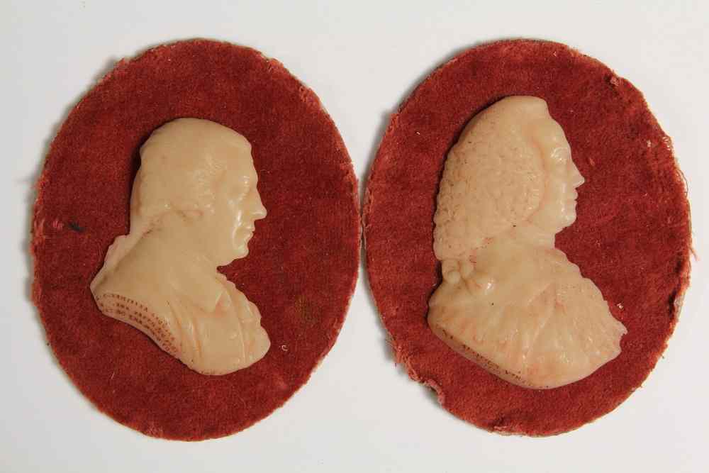 Appraisal: PAIR OF WAX PROFILE RELIEF PORTRAITS -English signed Tassie James