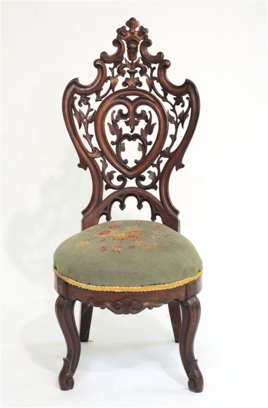 Appraisal: Victorian slipper chair with pierced back with carved foliate scrollwork