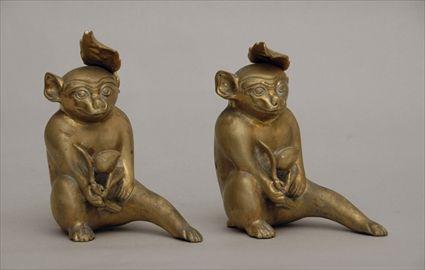 Appraisal: Pair of Gilt-Metal Monkeys Provenance from the Estate of Emma