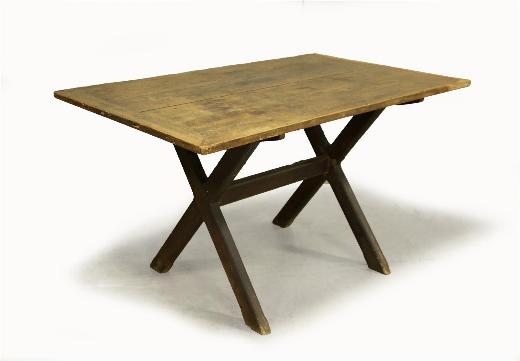 Appraisal: SAWBUCK TABLE American pine Constructed with old parts Two-board top