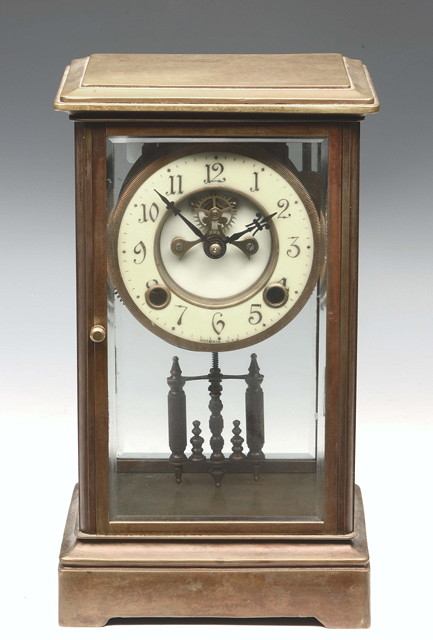 Appraisal: AN ANSONIA BRASS FOUR GLASS MANTEL CLOCK the two piece