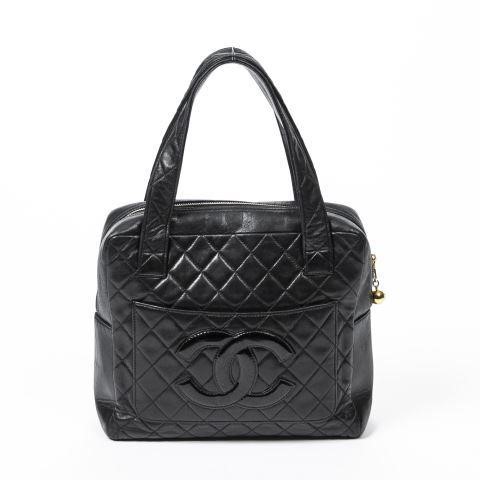 Appraisal: Chanel pocket logo handbag in black quilted calf leather with