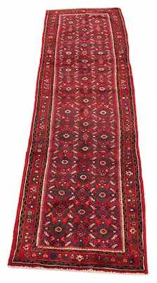 Appraisal: A Tabriz Runner Garnet red carpet overall with lattice panel