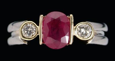 Appraisal: Ruby diamond ring central oval ruby estimated weight cts flanked