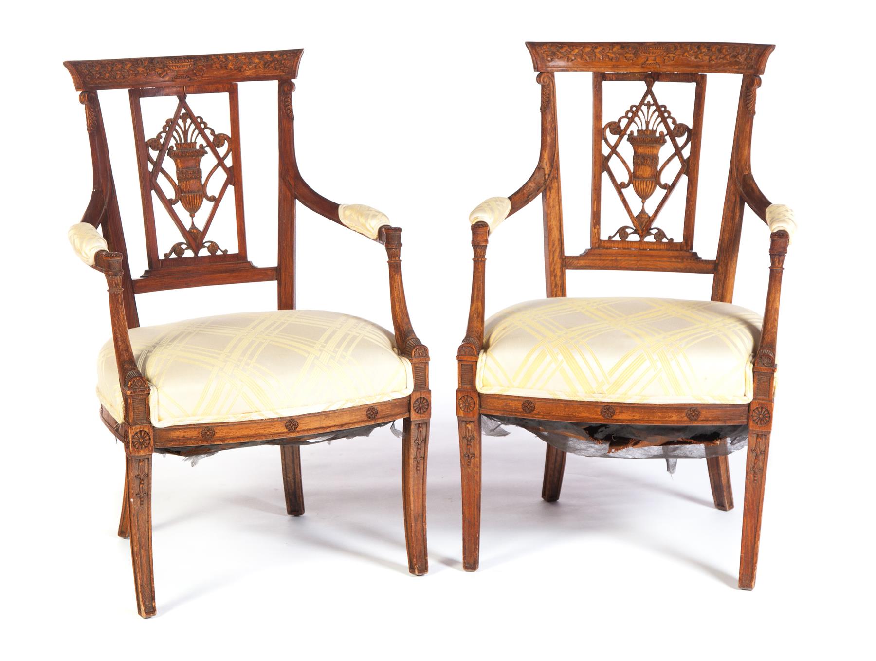 Appraisal: PAIR OF CARVED ARMCHAIRS European late th century mixed woods