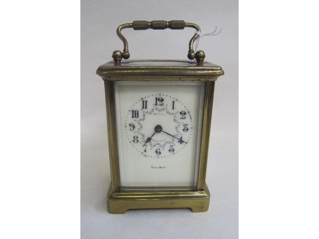 Appraisal: French brass cased carriage clock with floral decoration to dial