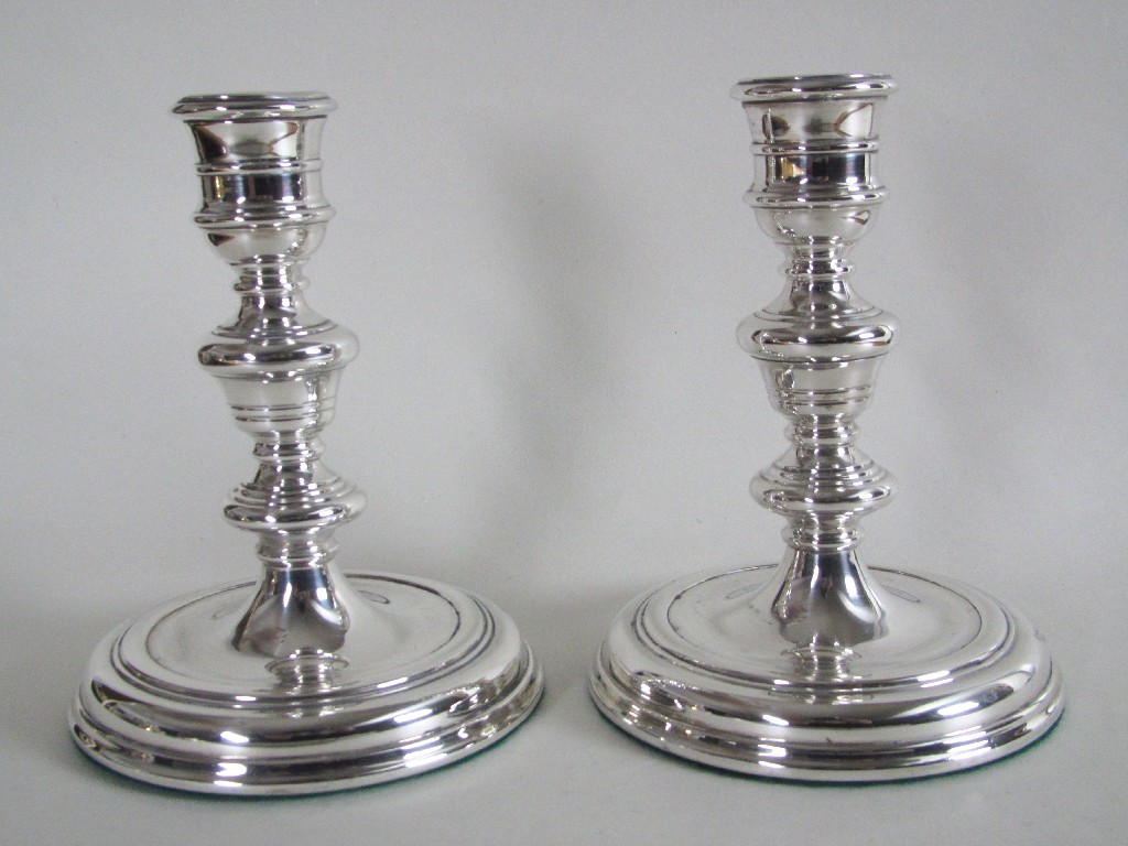 Appraisal: A pair of silver filled candl