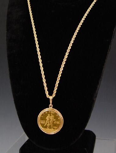 Appraisal: US DOLLAR LIBERTY OLYMPIAD NECKLACE US Dollar Liberty Olympiad coin