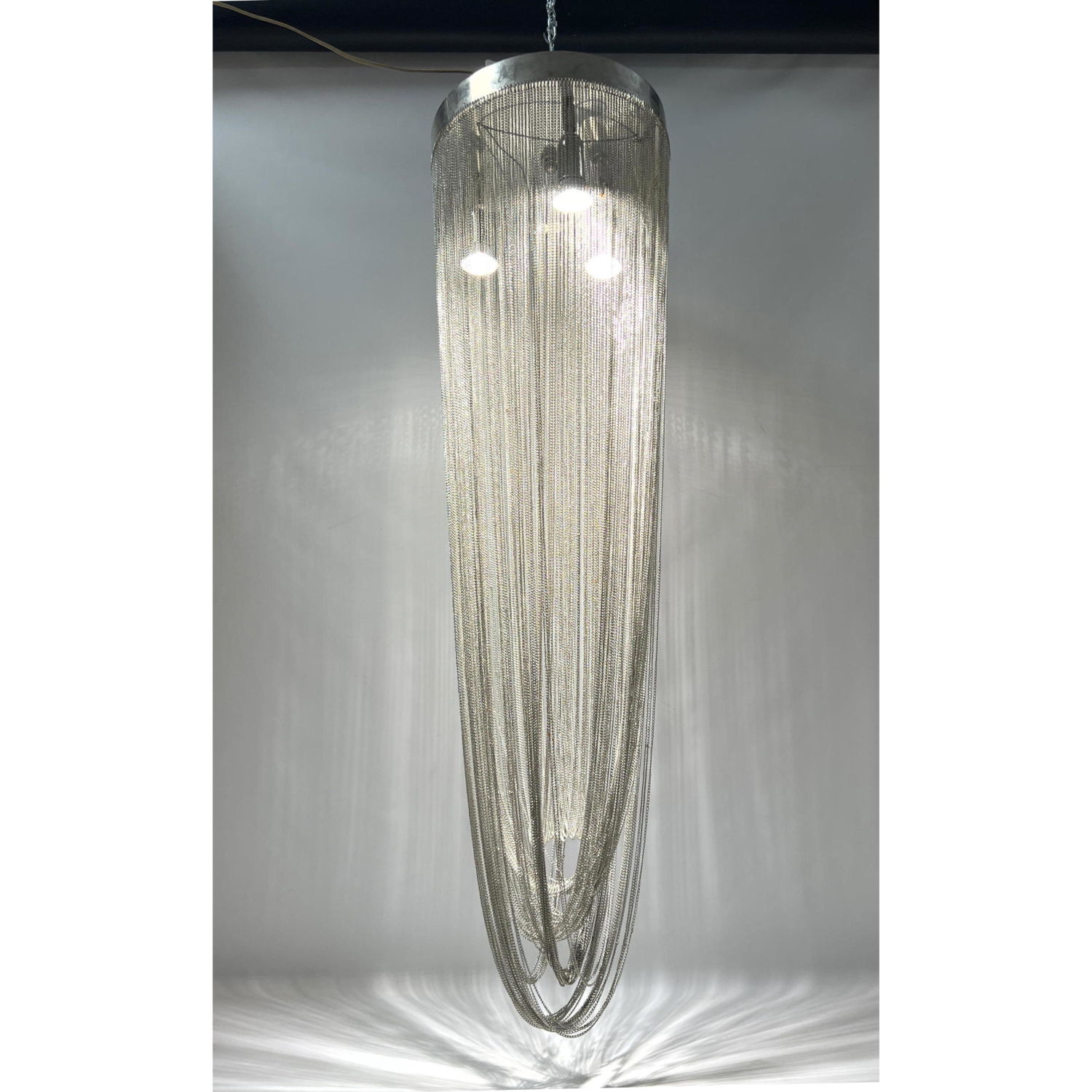 Appraisal: Modernist Chandelier with Metal Chain Strands Drape Cardin Style Dimensions