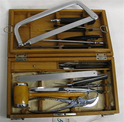 Appraisal: A GERMAN SURGEON'S FIELD OPERATING SURGICAL KIT in oak covered