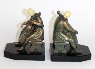 Appraisal: Pair vintage John Ruhl bronze clad bookends Pair of vintage