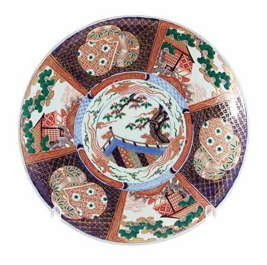 Appraisal: Massive Japanese Imari porcelain charger traditional alternating paneled design in