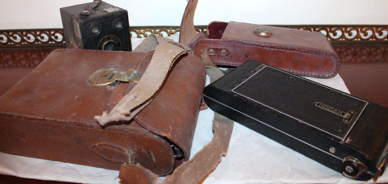 Appraisal: A Kodak A folding camera in leather case another folding