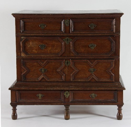 Appraisal: A th Century oak chest on stand with two short