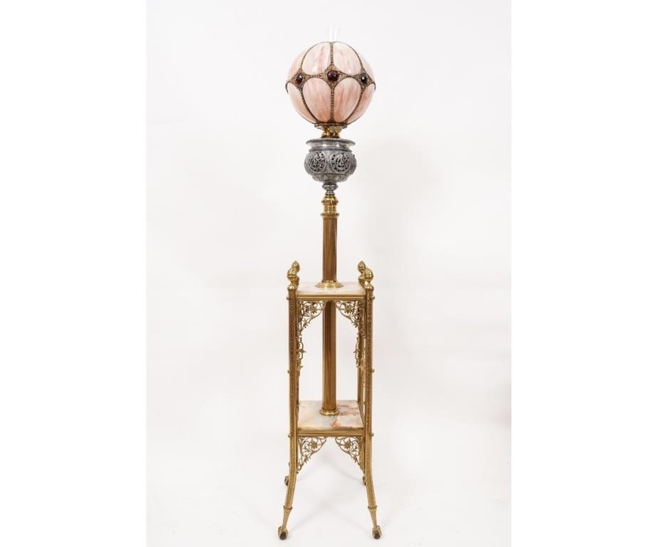 Appraisal: Edward Miller brass Prairie floor lamp with duplex burners and