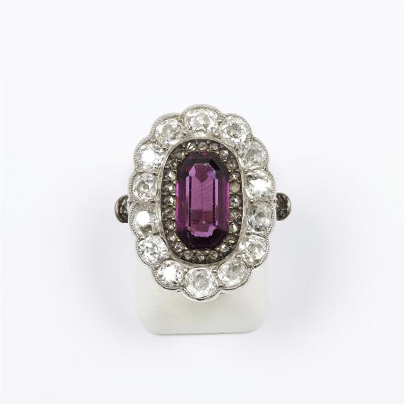 Appraisal: DIAMOND AND GARNET RING ca Platinum yellow gold and silver