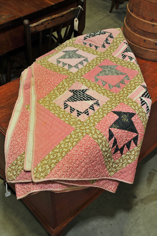 Appraisal: BASKET PATTERN QUILT Polychrome cotton quilt in shades of pink