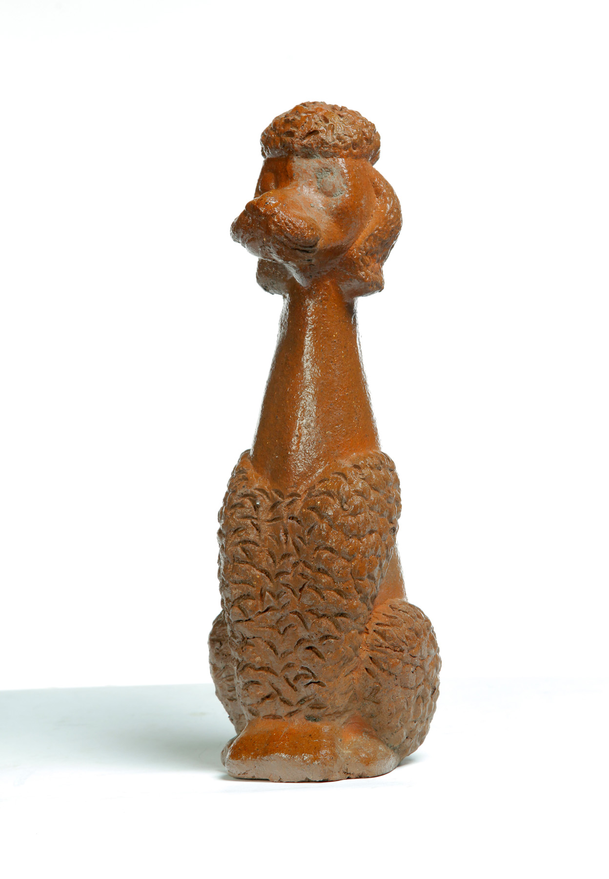 Appraisal: AMERICAN SEWERTILE POODLE Ca s Elongated seated poodle h