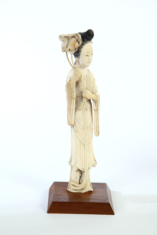 Appraisal: IVORY FIGURE China early th century Full-length figure of a