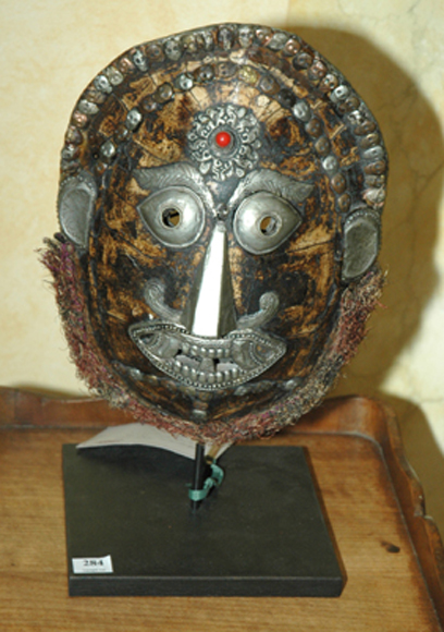 Appraisal: A NEPALESE TORTOISESHELL MASK Height cm