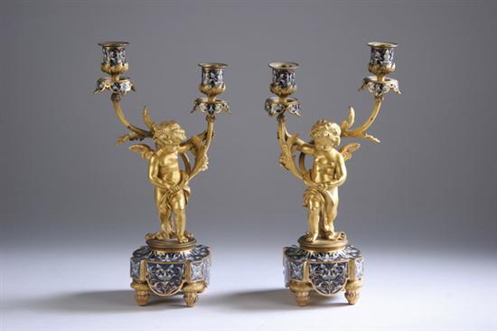 Appraisal: PAIR NAPOLEON III BRONZE-DOR AND CHAMPLEV ENAMEL TWO-LIGHT CANDELABRA last