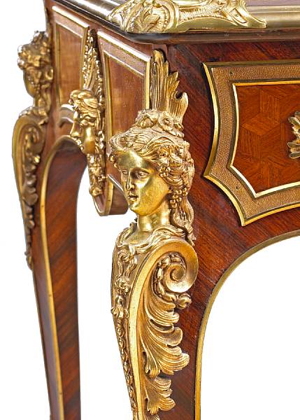 Appraisal: Furniture The gilt bronze banded rectangular top with inset leather