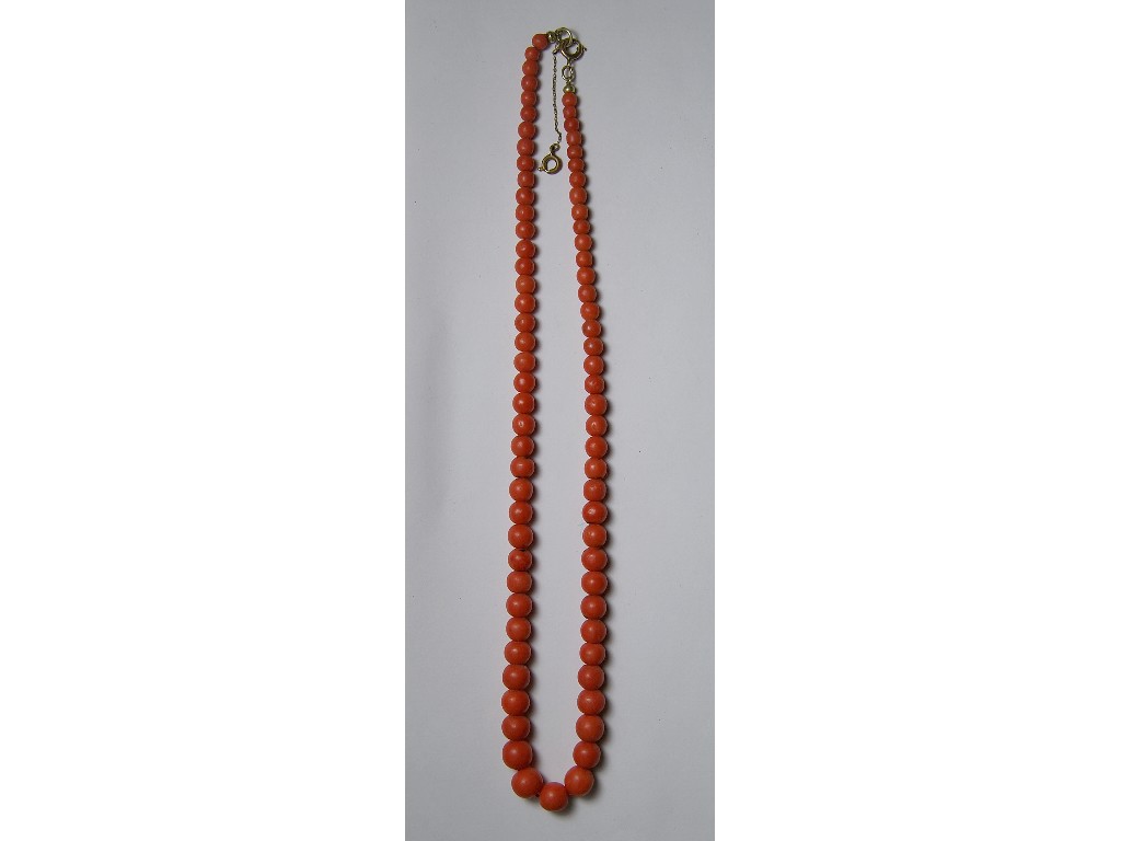 Appraisal: Graduated dark coral bead necklace