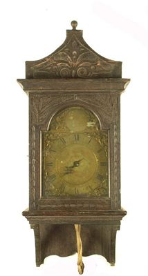 Appraisal: A hour oak cased hooded wall clock inch brass arched