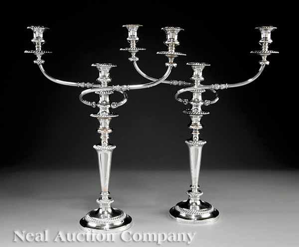 Appraisal: A Pair of Antique Sheffield Plate Three-Light Candelabra th c