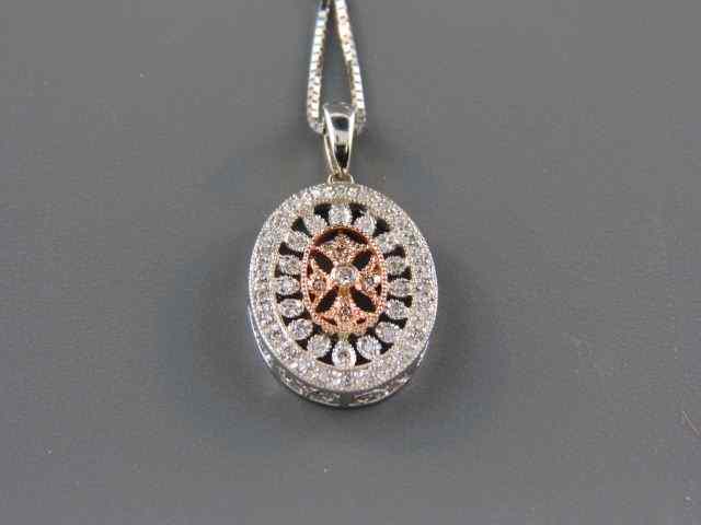 Appraisal: Diamond Pendant round brilliant diamonds totaling carat in fancy k