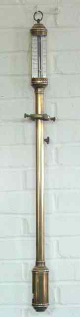 Appraisal: A ship's brass stick barometer th Century with gimbal mount