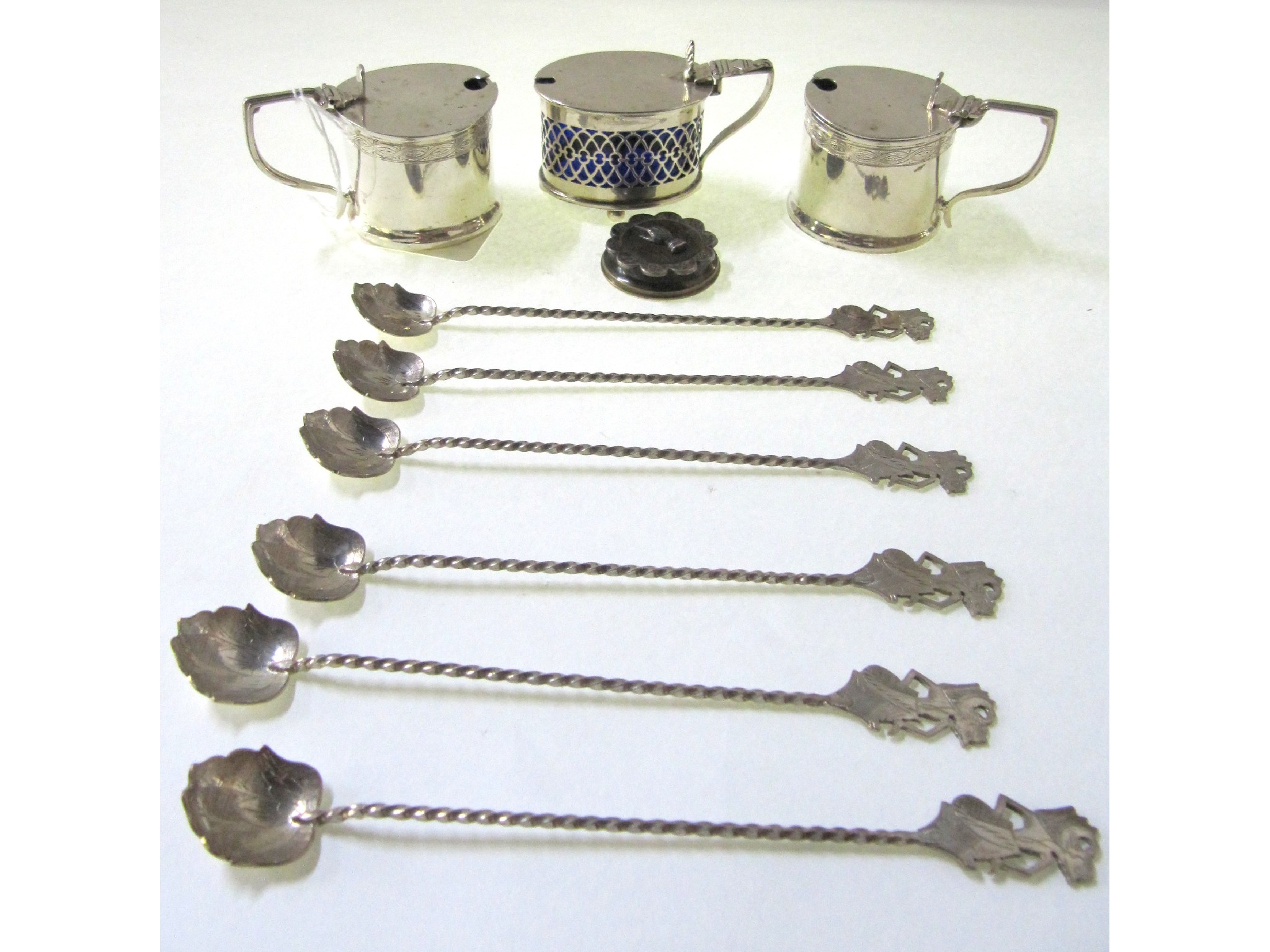 Appraisal: A lot comprising a pair of silver mustard pots Birmingham