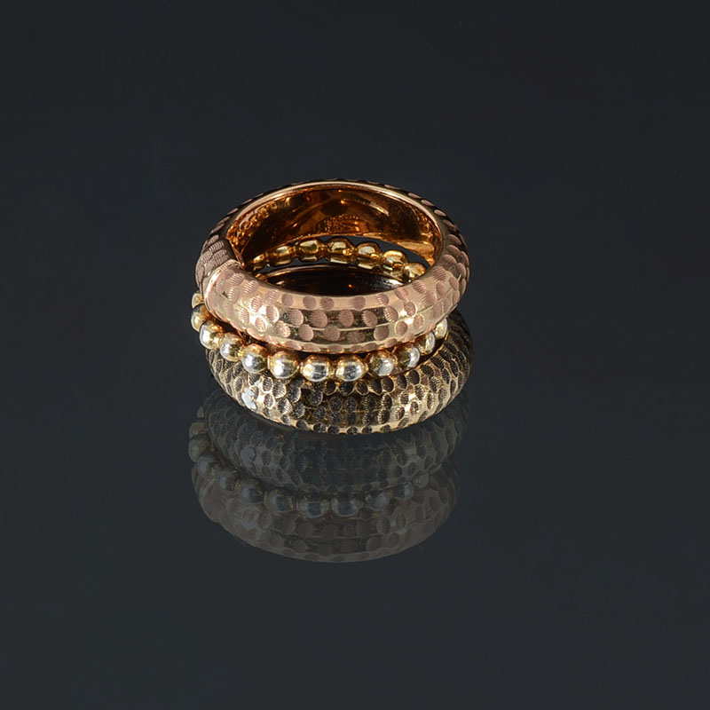 Appraisal: STYLISH K STACKING RINGS Two K yellow gold hollow bands